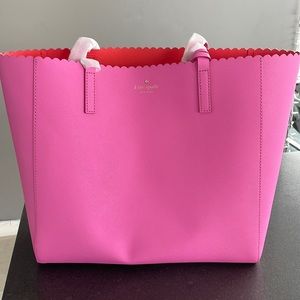 Brand new Kate Spade tote with tags and never used.